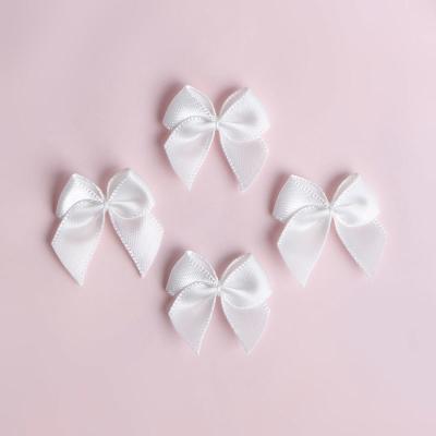 China Underwear Decoration 22*23mm Satin Ribbon Bows with Pre-made Design for sale