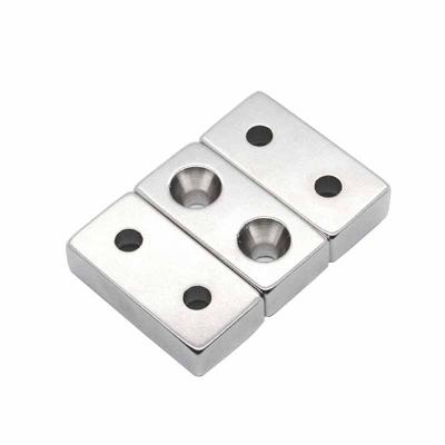 China Industrial Strong NdFeb Pot Rectangular Channel Industrial Magnet Customized N52 Neodymium Block Magnet With Countersunk Hole for sale