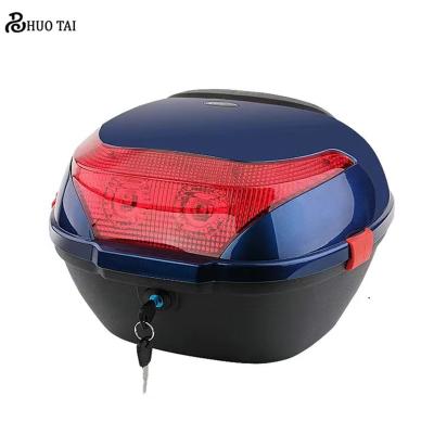 China 28L Large Capacity PP Motorcycle Trunk Storage Box Plastic Universal Waterproof Motorcycle Tail Box Can Be Put In A Full Helmet for sale