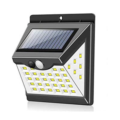 China Warehouse 4W Wireless Outdoor Solar Security Wall Light With Auto Adjusting Work Modes IP65 Waterproof Led Solar Wall Lamp for sale