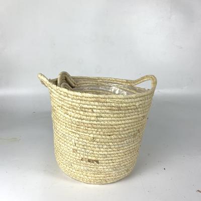 China Wholesale New Modern Design Outdoor Grass Woven Baskets Plant Artificial Flower Pot For Decoration for sale