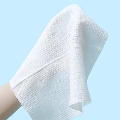 China Travel Disposable Compressed Pure Portable Compressed Water Cotton Washcloth Wet Towel Moistened Tissues Face Towel for sale