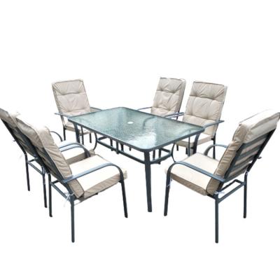 China WMXY-001 7pcs cushion padded chair outdoor table and padded chair set luxury garden stacking chair and rectangle table set for sale