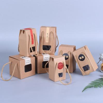 China Recycled Custom Packaging Materials Foodstuff Kraft Paper Cardboard Cardboard Wine Gift Box With Handle for sale