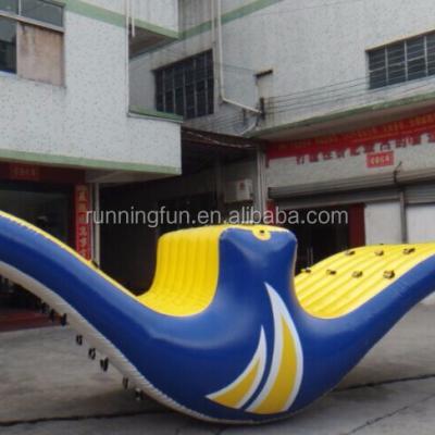 China 0.9mm Pvc Tarpaulin Plato Floating Inflatable Water Revolution Totter For Sale for sale