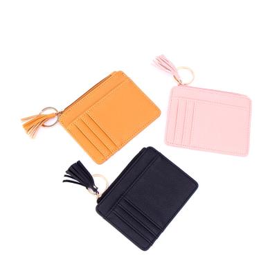 China New Design Waterproof Hot Selling Card Case Small Purse Women Roll Small Wallet With Tassel for sale