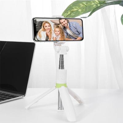 China Hot Selling Amazon Fold Functional Mutli Face Tracking BT Mobile Phone Fill Light Wireless Remote Flexible Selfie Stick Foldable Tripod for sale