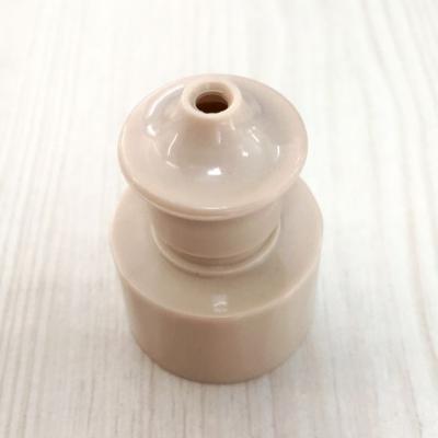 China Non Spill Ribbed 28/410 Push Pull Cap Ribbed Plastic Cap Bottle Cap for sale