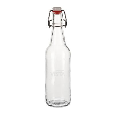 China Eco-friendly Clear Round Glass Beverage Swing Top Bottle 500ml Beer Bottle With Swing Top for sale