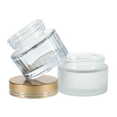 China 50ml cosmetic mist frosted glass cosmetic jars cream glass jar with gold foil stamping lid 30g 50g 70g available for sale