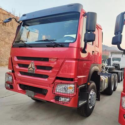 China Tipo de combustible diésel Sinotruk Tractor de camión usado Cabeza 371HP 6X4 Con ventana manual en venta