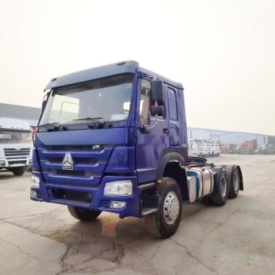 China Precio asequible HOWO 6X4 375HP cabeza de camión tractor usado con cabina cómoda en África en venta