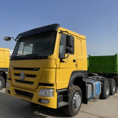 China 12.00R20 Tire 300-400L Fuel Tank Capacity 371HP 6X4 Tractor Head HOWO Used for sale