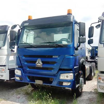 China Sinotruck usado HOWO 371 380 400 430HP 6X4 Tractor Truck cabeza con transmisión manual en venta