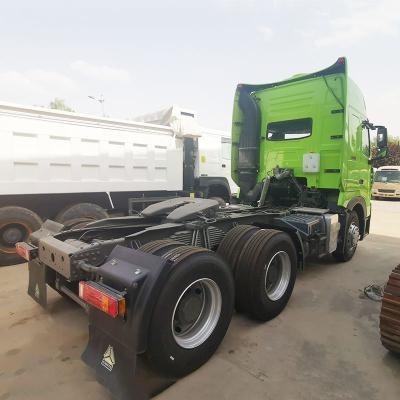 China Camión chino usado Sinotruck Howo T7H 480 540 HP 6X4 Tractor Truck Head con tanque de combustible de aluminio en venta