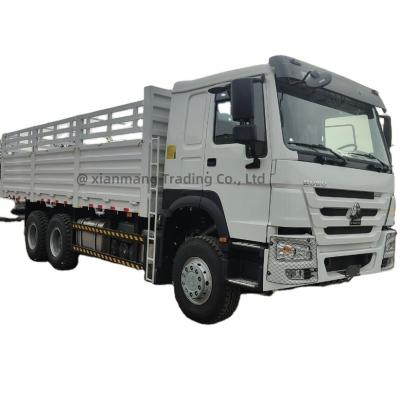 중국 시노트룩 HOWO 6X4 371HP 20-30t 울타리 화물 트럭 3 축 사용 된 드래그 바 트레일러 판매용