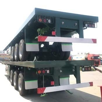 China Customizable 2 3 4 Axles 30tons 40 Tons 50 Tons Shipping Container Flatbed Semi Trailer With Tractor Truck for sale