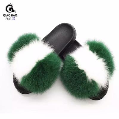 China Fashion Trend Slippers Best Selling 2021 Luxurious Fur Plush Women's Indoor LeatherSlides Slippers Black Slippers for sale