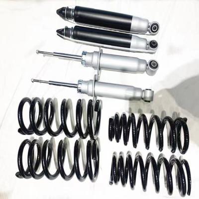 China Steel+aliunimn 4x4 off road shock absorber twin tube no foam cell adjustable suspension kits supplier for Pajero 87/93/97 for sale