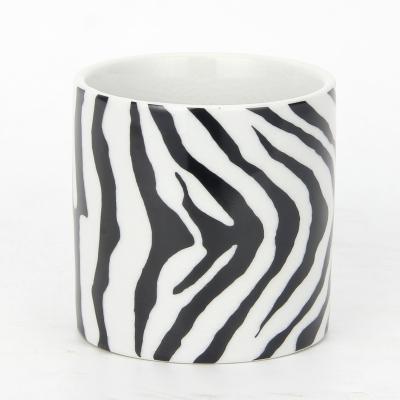 China Home wholesale ceramic candle cup custom zebra decoration candle pots flower pots ceramic candle jar for sale