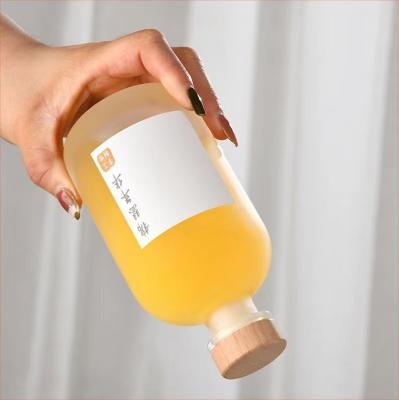 China Beverage 250ml 500ml Frosted Clear Fruit Juice Ice Wine Glass Bottle With Cork for sale