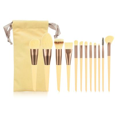 China Angular Blush Wholesale 12pcs Cute Cheese Yellow Makeup Brush Set With Gift Bag Soft Hair Brush For Women Makeup for sale