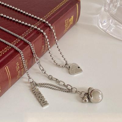 China Cold Wind Small INS Luxury Titanium Steel Necklace For Women With Non-fade-out Clavicle Chain Multilayer Web Love Pendant for sale