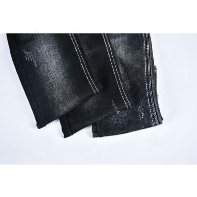 China Wholesale factory price of breathable hot sale GV328 blue and black men's jeans denim fabric for sale