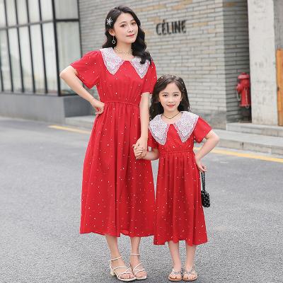 China Mommy and me anti-shrink family clothing thin dress summer polka dot chiffon dress children's princess western style short-sleeved dress for sale