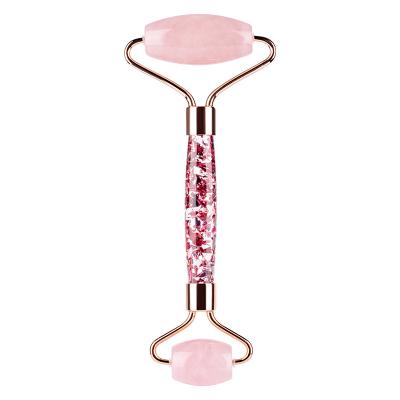 China Jade Roller Superior Rose Quartz Hand Held Natural Facial Roller 100% Glitter Pink Handle Rose Quartz Roller for sale