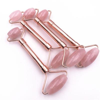 China Anti Aging Metal Hand Held Handle Rose Quartz Facial Jade Roller SPA Massage Stone Roller for sale