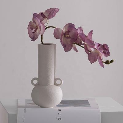 China Simple creative modern flower arrangement table decoration in dry living room by INS simple and modern ceramic flower vase Nordic ceramic decoration for sale