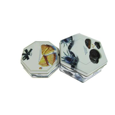 China Recycled Materials Custom Design Tea Tin Box Wholesale Hexagon Shaped Cookie Tin Hexagon Box for sale