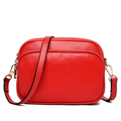 China Water Proof Customized Fashion Genuine Top Grain Leather Cowhide Bags For Female Minimalist Style for sale