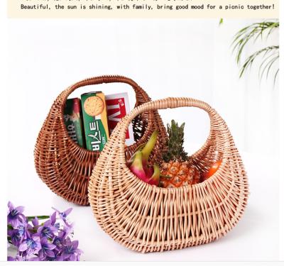 China wicker egg baskets willow picnic baket with handle hand made manuafcturer brown color customize size bread basket for sale