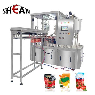 China Beverage Juice Automatic Rotary Spout Pouch Filling Machine Spout Pouch Filling And Capping Machine for sale