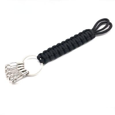 China Outdoor Handwoven Handwoven Key Chain EDC Seven Key Chain 5 Carabiner Durable Umbrella Mountaineering Survival Rope for sale