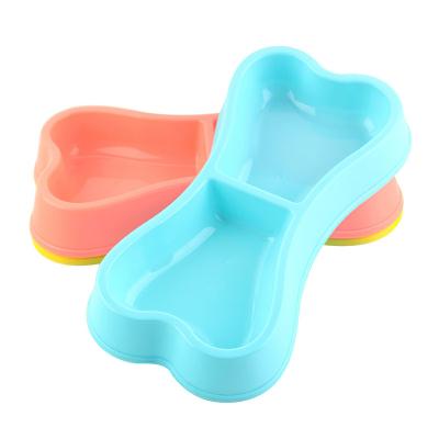 China Viable 3 Color Dog Bowls Double Bone Shaped Plastic Water Food Feeder Pet Bowl Feeding Container for sale