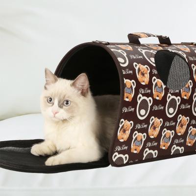 China Cartoon Print Pet Carrier Cats And Dogs Stored Portable Breathable Comfortable Pet Travel Carrier Bag for sale