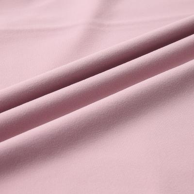 China Quick Dry Stretch Swimwear Warp Knit Tan Through Nylon Spandex Anti-UV 4 Way Stretch Ply Underwear Fabrics for sale