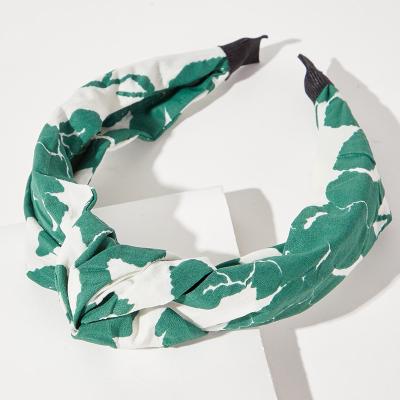 China 2021 popular spring and summer new green fabric printing headband women tied small fresh holiday wind forest cross hair accessories for sale