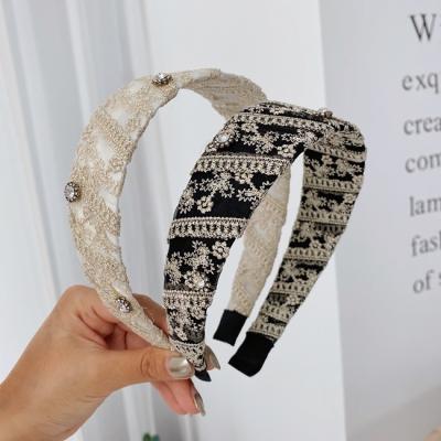 China New Diamond Winding Headband Temperament Popular Baroque Simple Lace Mesh Non Slip Fashion Hairband Wide Brim Hairband for sale