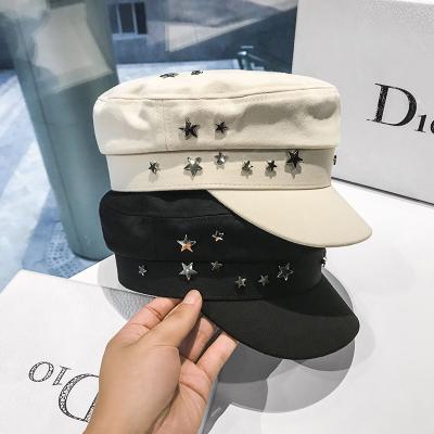 China 2022 Wholesale 2022 Tongue Duck Image Hats Women Retro British Navy Star Embellish Flat Hat Fashion Beret Hats for sale