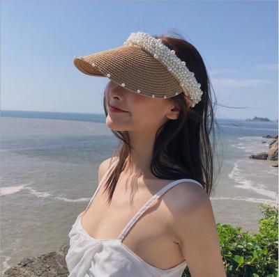 China Handmade straw hat women summer beach picture pearl shade sun hat girls fashion hollow hat wholesale for sale