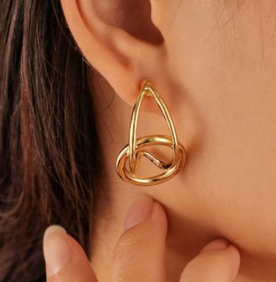 China Chunna New Environmental Friendly Irregular Gold Plated Fashion Alloy Knotted C Shape Stud Earrings For Women Girls for sale