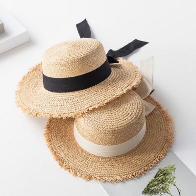 China High Quality Eco-friendly Raw Material Women Brim Wide Bowknot Ribbon Cowboy Cap Paper Flat Man Panama Hat Summer Sun Beach Raffia Straw Hats for sale