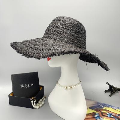 China 2022 New Eco-friendly Raw Material Women Round Raffia Wide Straw Hats Summer Sun Beach Panama Bucket Hat Paper Flat Brim Cowboy for sale