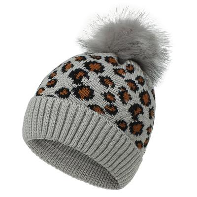 China JOINT Women's Leopard Slouchy Animal Knit Skull Big Pom Vintage Cheetah Print Winter Hat 15CM Hats for sale