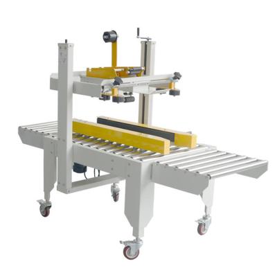 China Simple maintenance easy operation e-commerce automatic carton sealing machine, automatic band sealing and packing machine for sale