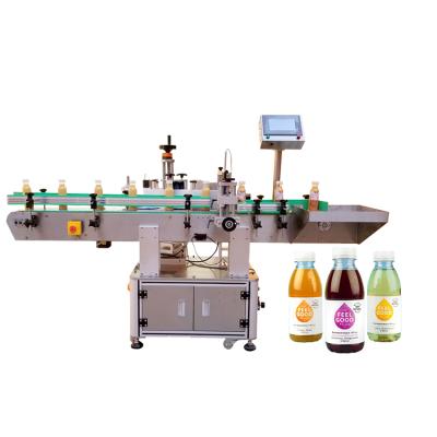 China food round bottle automatic positioning self-adhesive labeling machine cosmetic labeling machine for sale